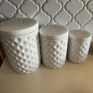 3 white textured kitchen canisters